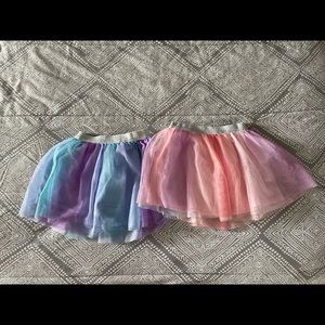 Size 4 tutus, one pink and one blue